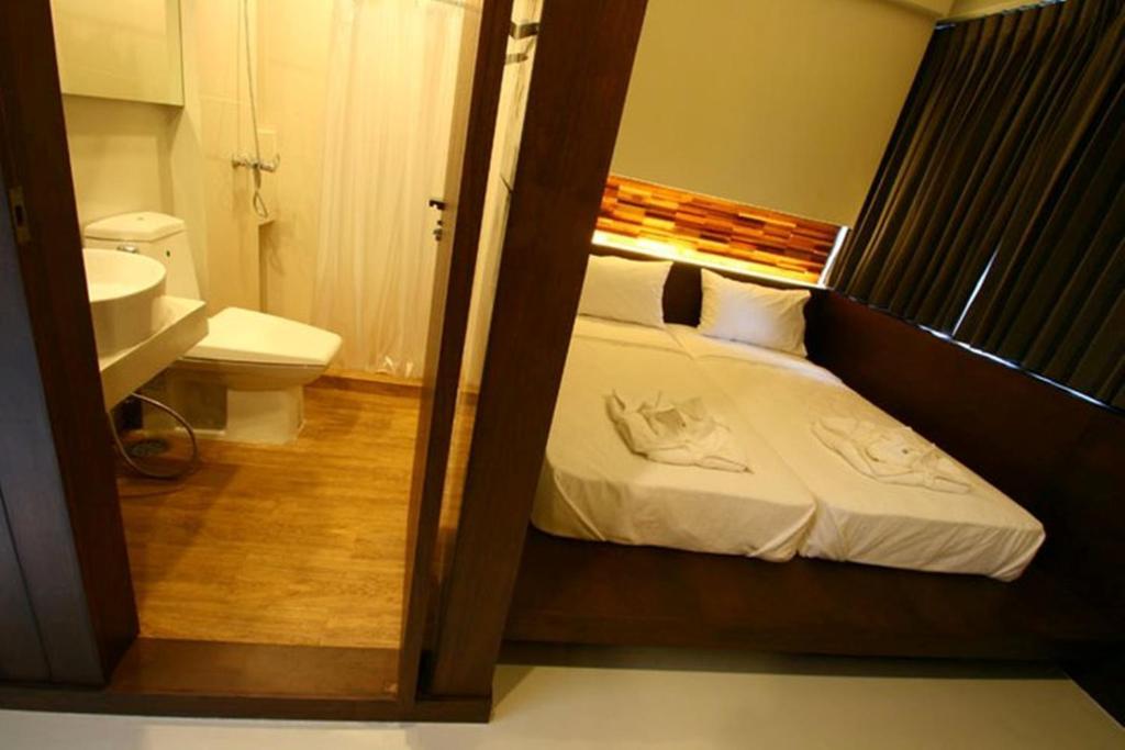 At One Inn Hualampong Banguecoque Quarto foto